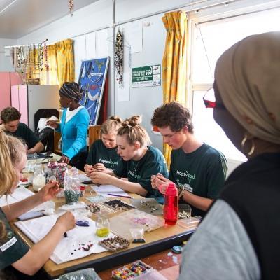 Projects Abroad interns assist entrepreneurs during one of our International Development internships in South Africa. International Development interns work with businesswomen to support a local community during an internship project in South Africa.